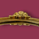 Antique wall mirror in gilded resin – back in red velvet