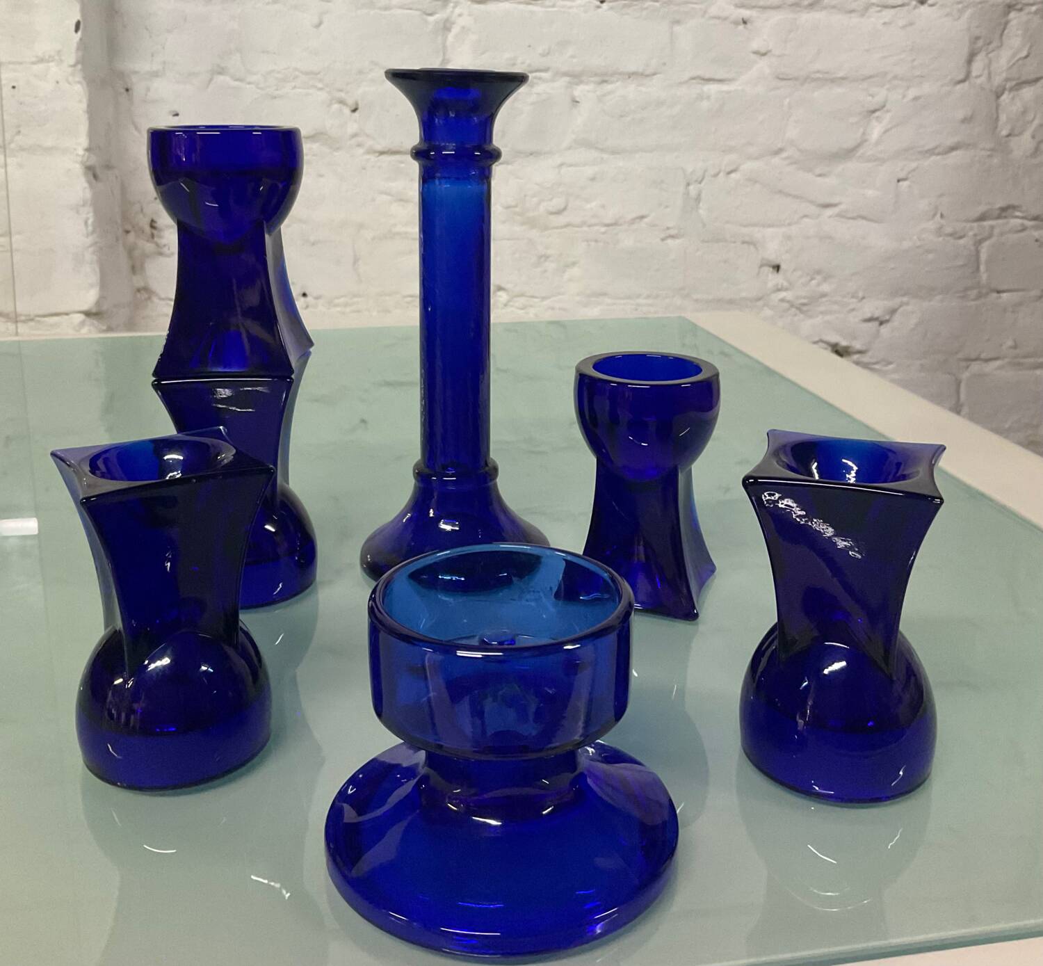 Set of 7 vintage cobalt blue glass footed candlesticks