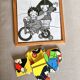 Wooden frame puzzle from the 60s/70s depicting two children on bicycles.