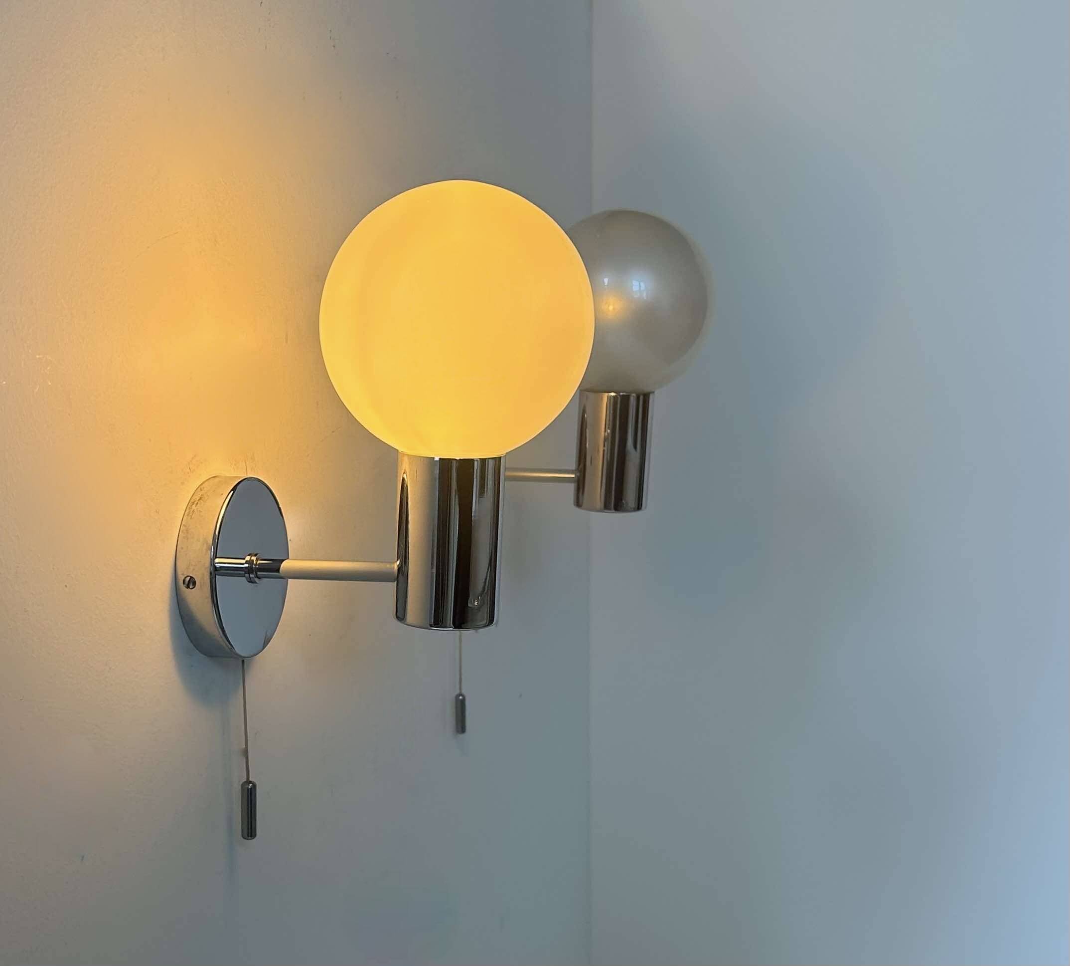 Pair of vintage wall lights, chrome and glass, Germany 1970