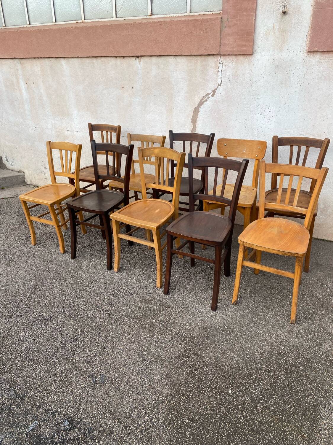 Set of 10 mismatched bistro chairs