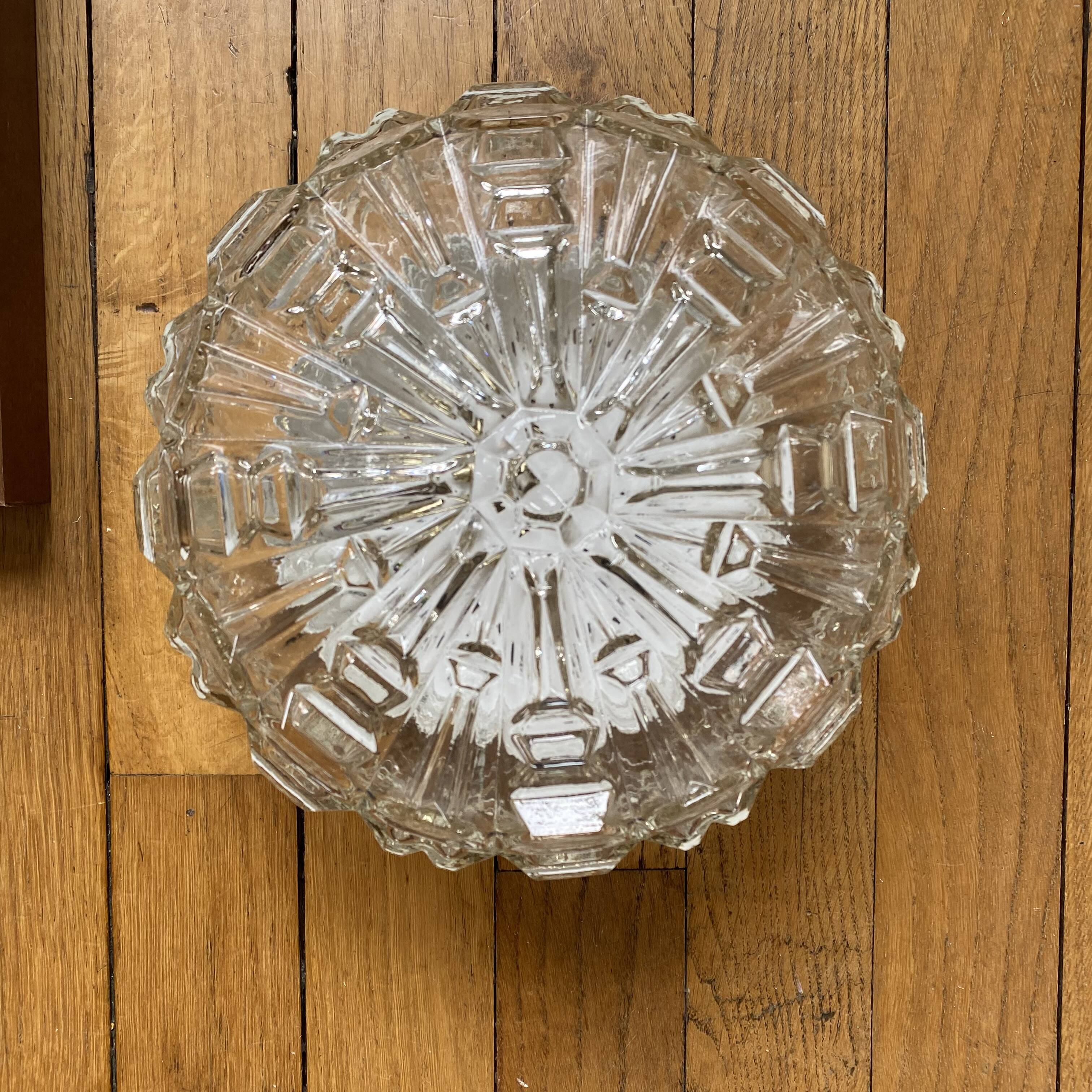 Wall lamp or ceiling light with minimalist porthole glass.