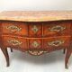 Commode de style Louis XV en placage d'acajou et bois de rose XX siècle