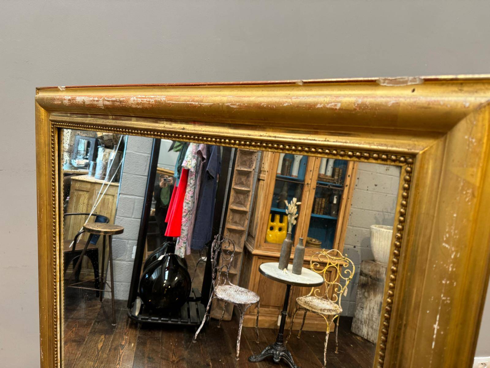 Antique gilded fireplace mirror