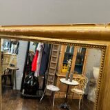 Old gilded fireplace mirror