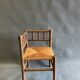 Chaise d’angle en bois et paille années 50