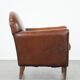Armchair made of sheepskin leather in art deco design with warm colours