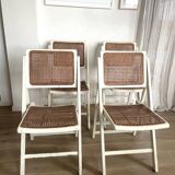 4 folding chairs with wicker seating