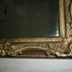 Miroir en bois et stuc redoré de style rocaille 33x29