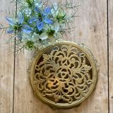 Vintage gilded brass trivet
