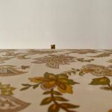 Large vintage rattan and wicker sewing basket with floral decor seat