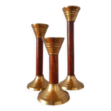 Set of three vintage wooden and brass candlesticks