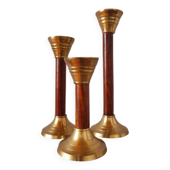 Set of three vintage wooden and brass candlesticks