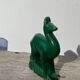 Art Deco figurine of a green ceramic doe