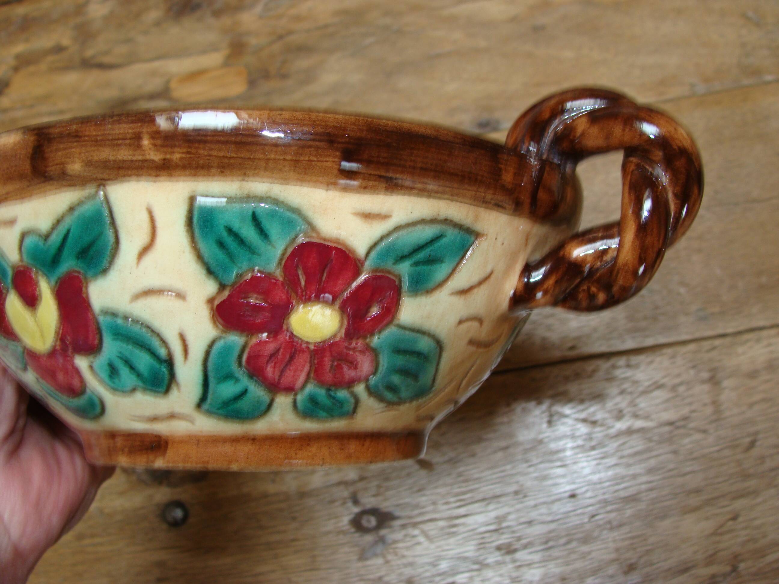 Antique engraved and enamelled ceramic cup