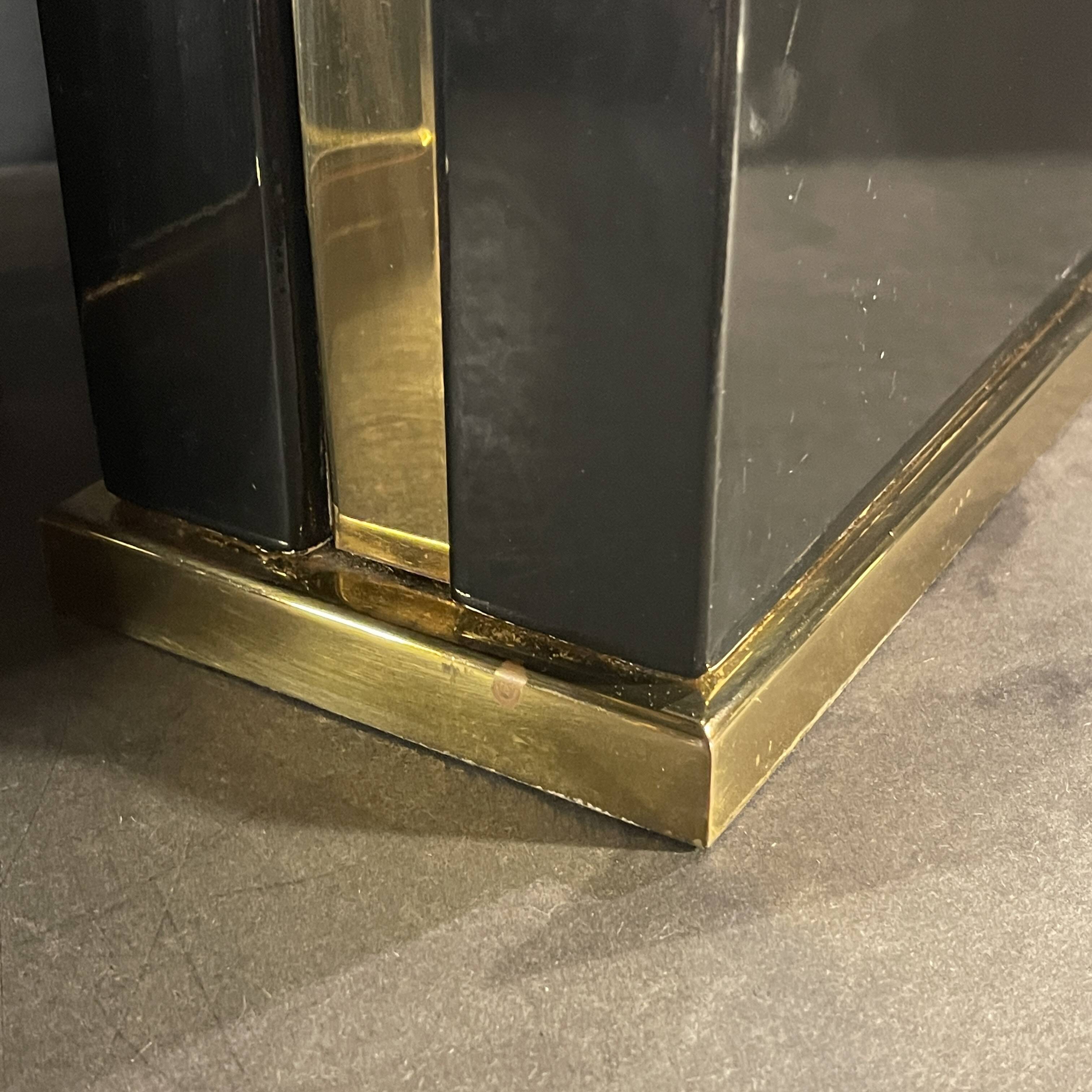 Pair of black lacquered and brass table lamps, circa 1970