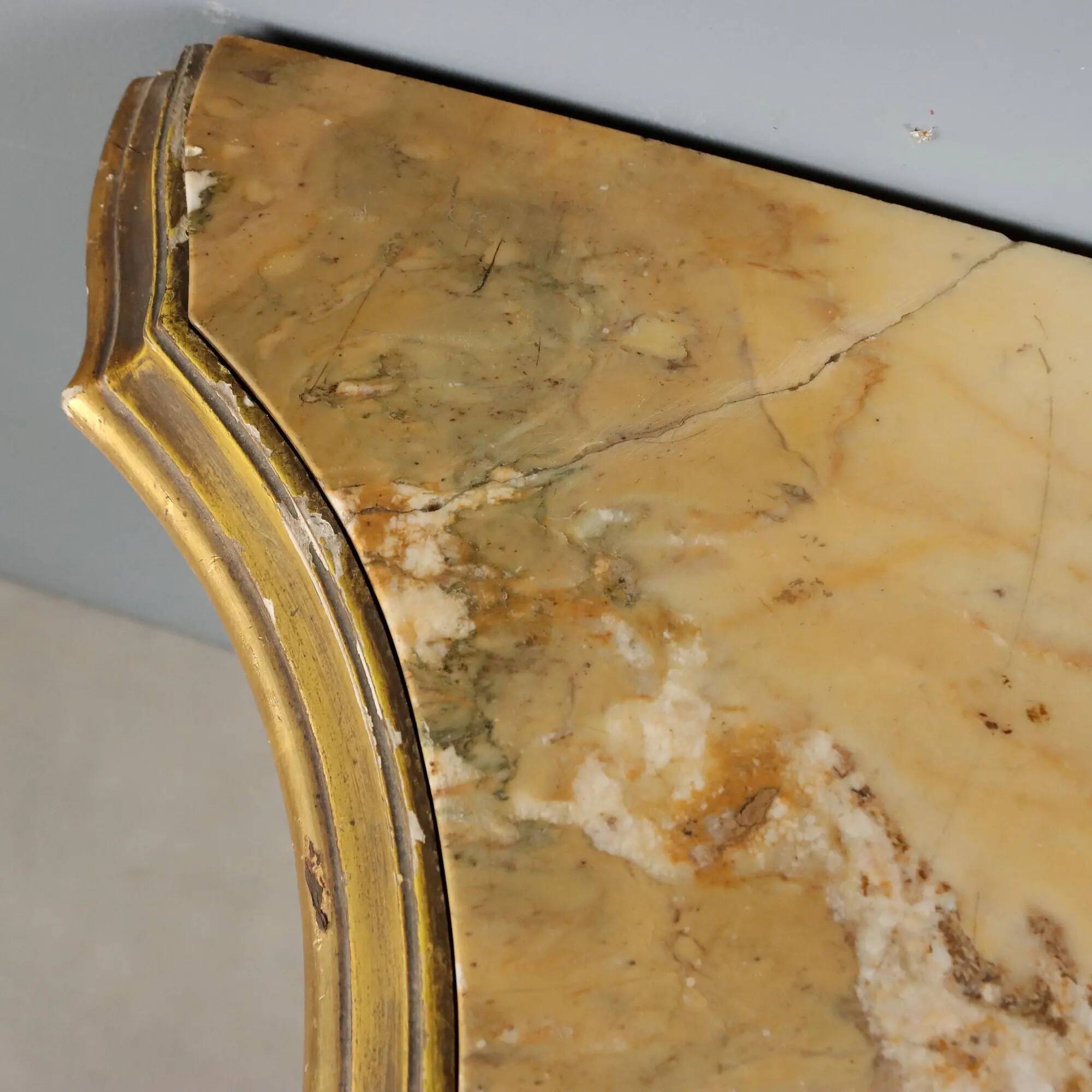 Antique console in carved gilded wood and marble, Italy, 19th century.