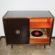A vintage cabinet with a record player and a bar, 1960s.
