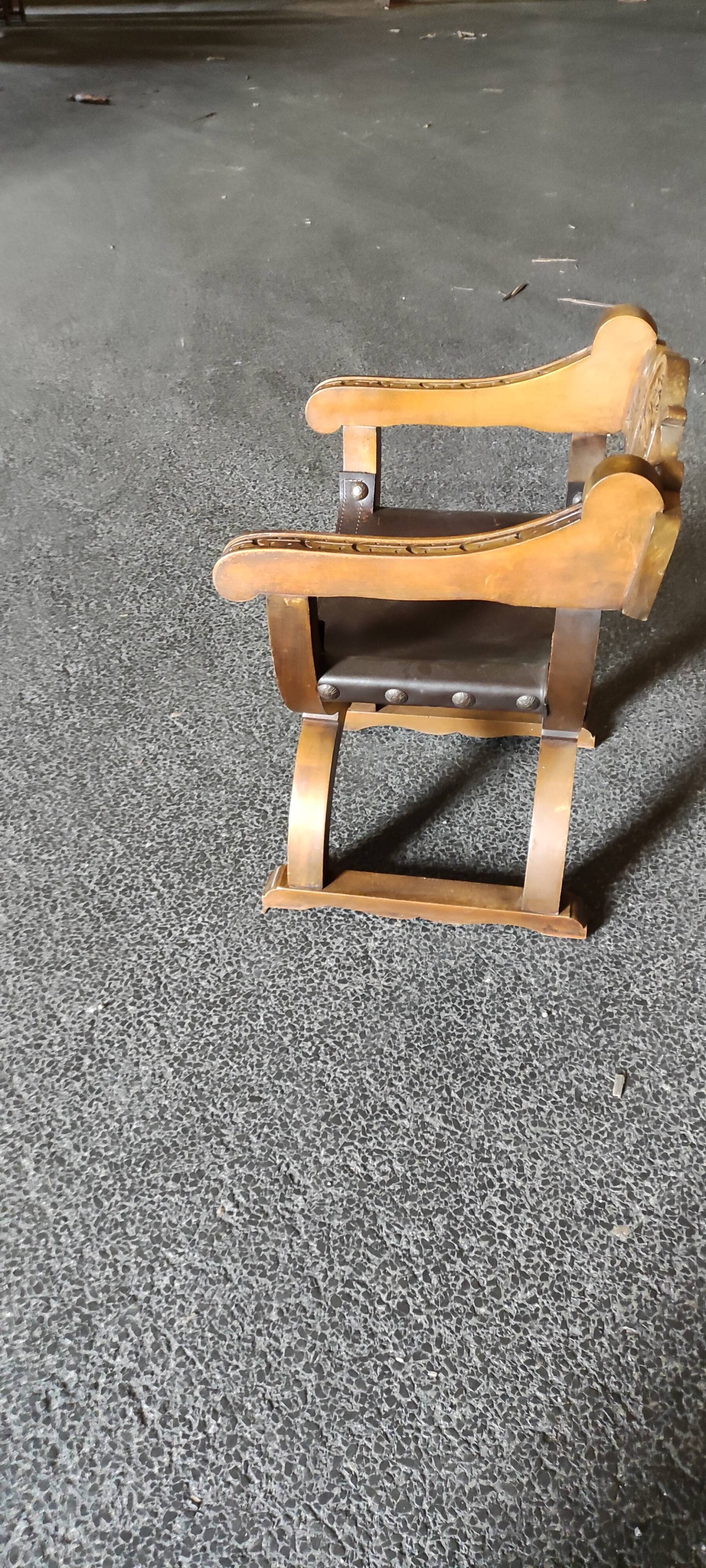 Armchair called Dagobert in wood and leather