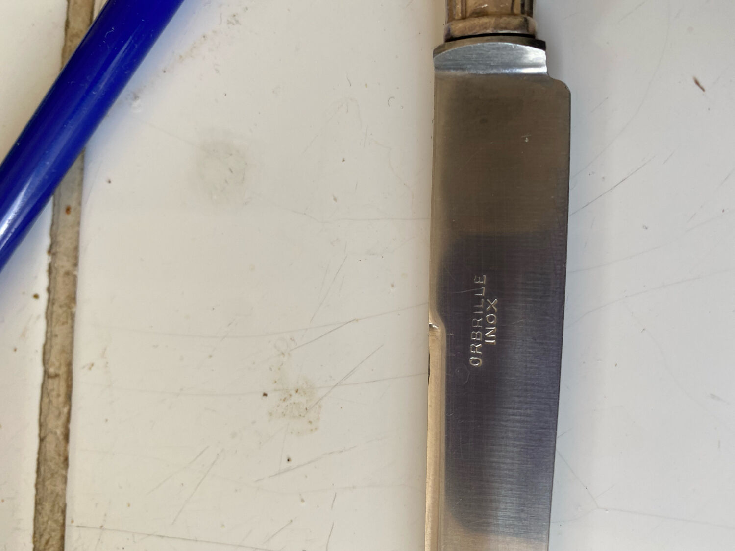 Box of silver metal knives