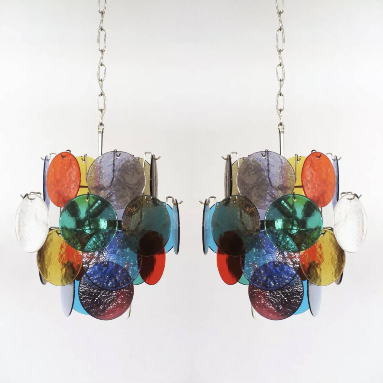 Pair of 4-light hanging chandeliers in Murano glass, Italy, 1980s.