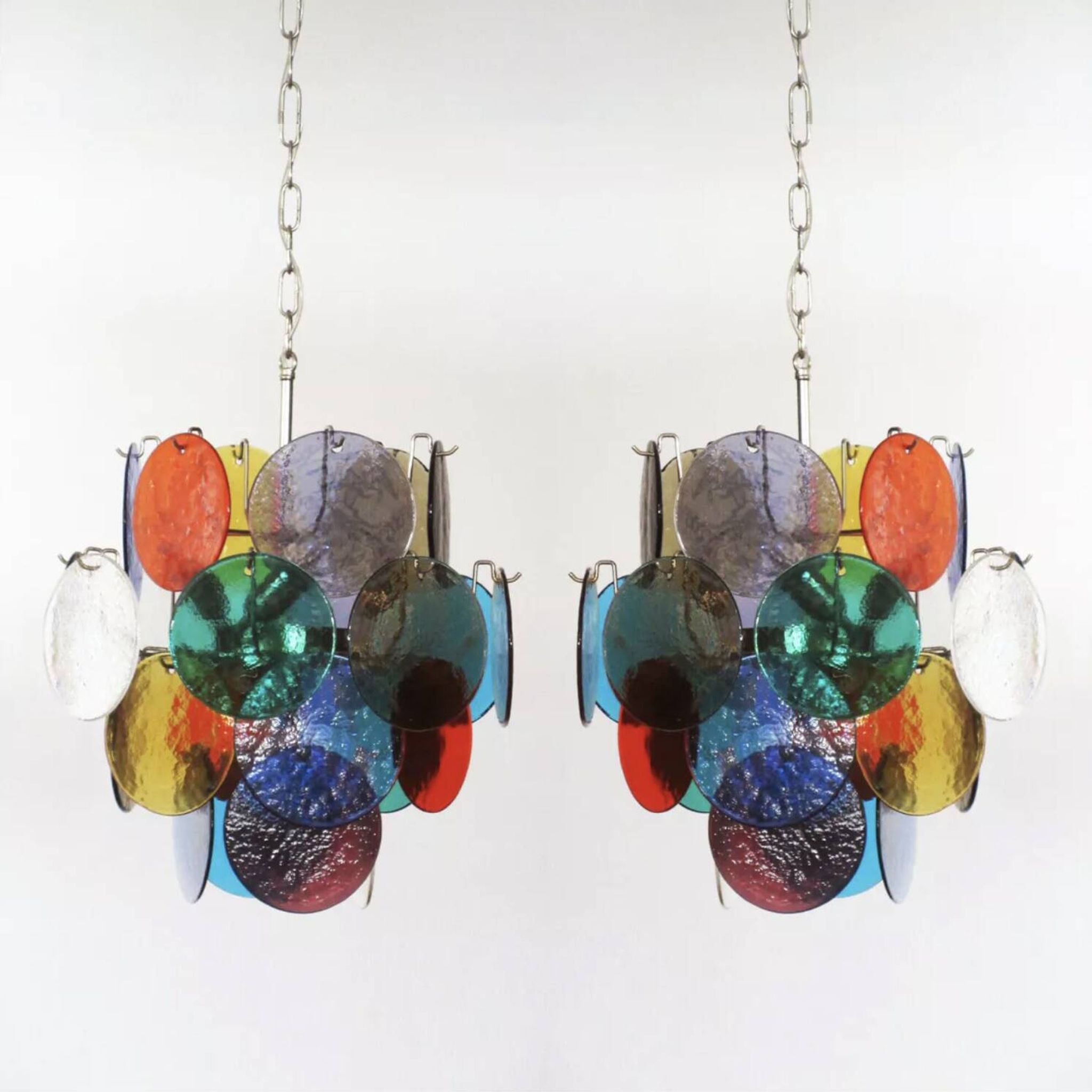 Pair of 4-light hanging chandeliers in Murano glass, Italy, 1980s.