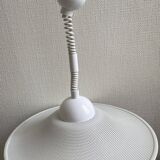 Suspension of the 80s in perforated white metal