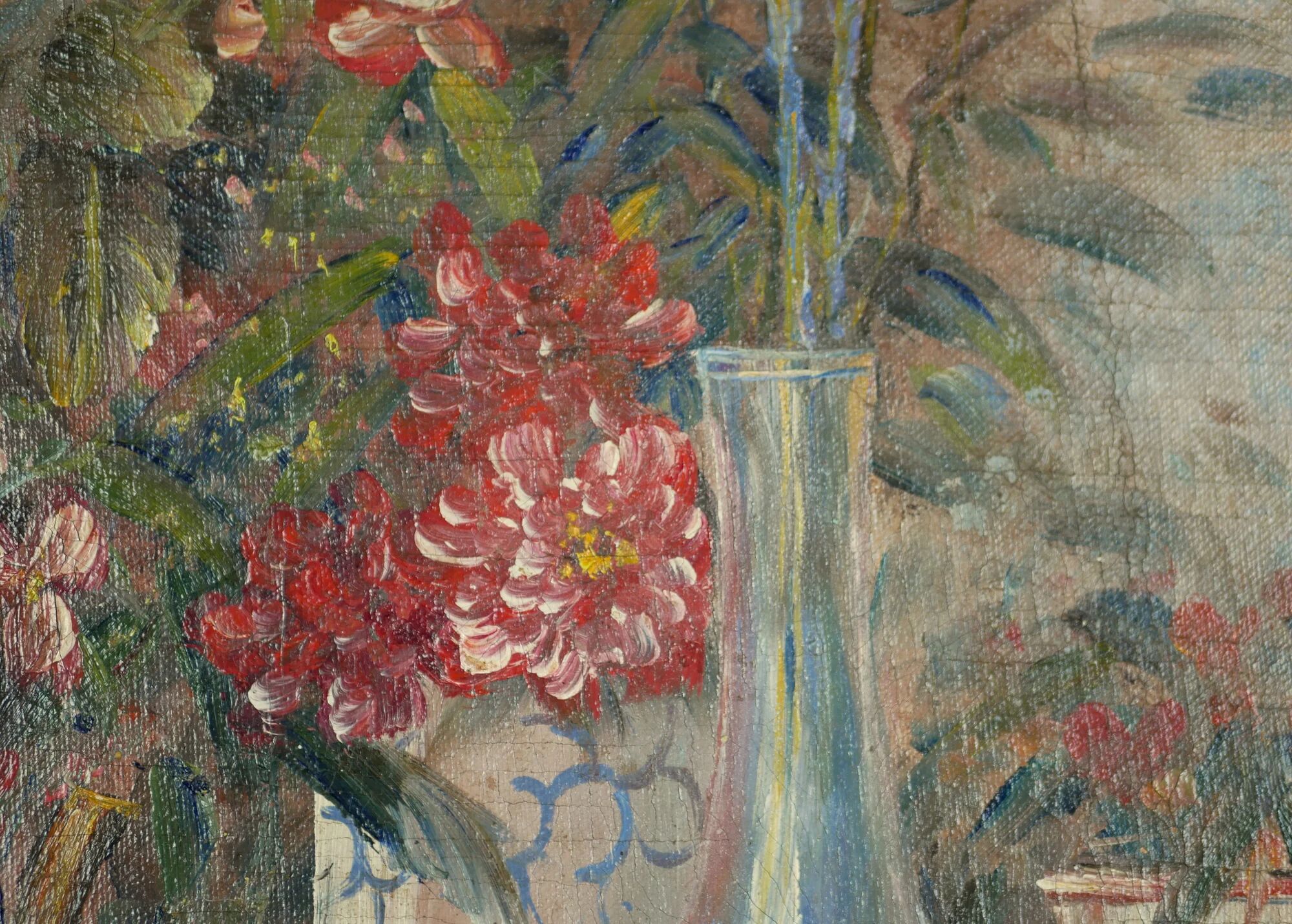 Still life with pink flowers and blue pots.