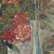Still life with pink flowers and blue pots.