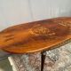 Louis XVI style oval dining table with rosewood marquetry extension mounted in bronze