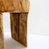 Brutalist sculptural chair in solid oak in wabi-sabi style.