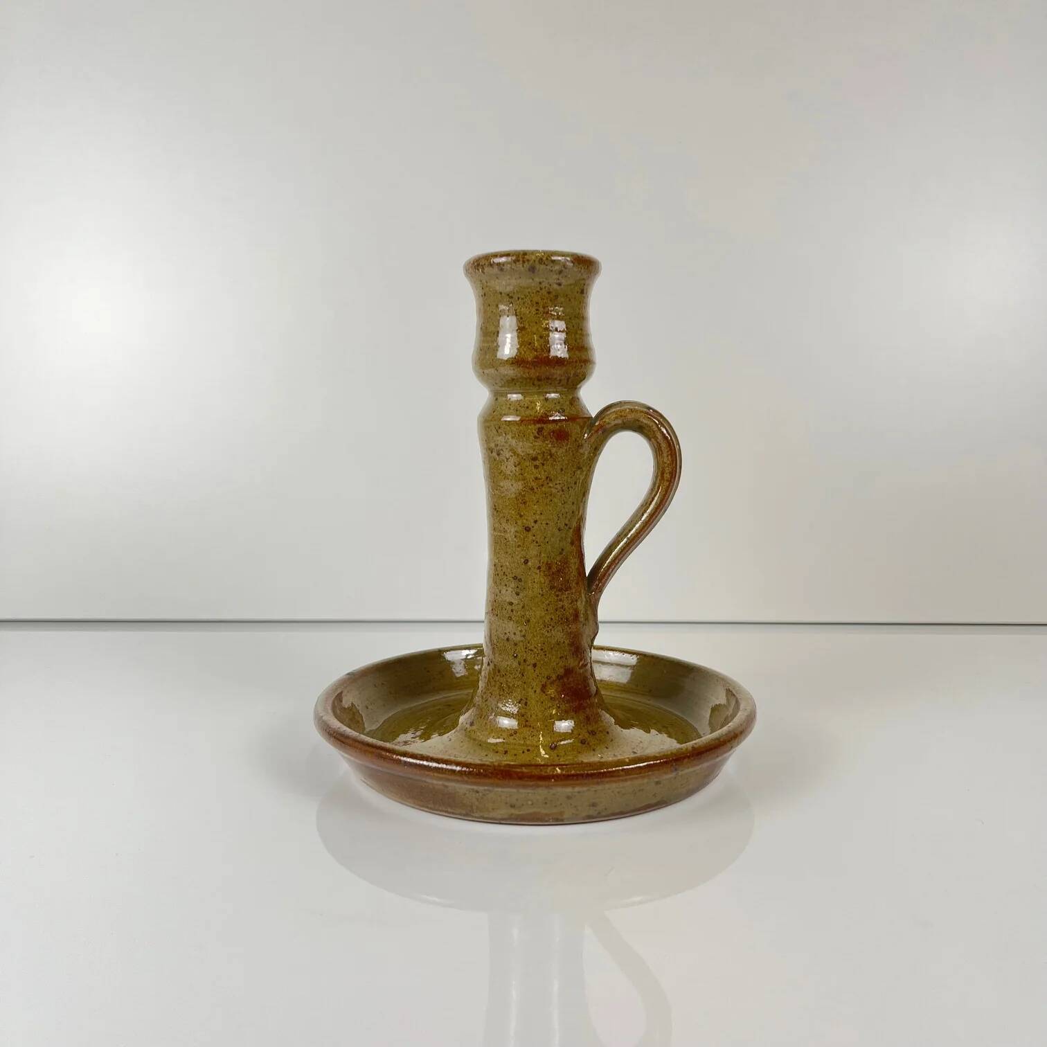 Stoneware hand candlestick