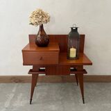 Varnished wooden bedside table