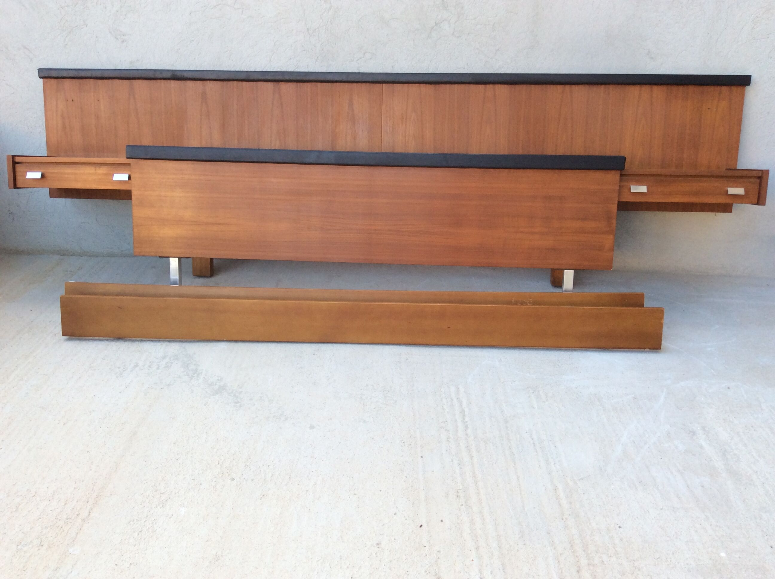 Scandinavian-style teak bed with integrated nightstands