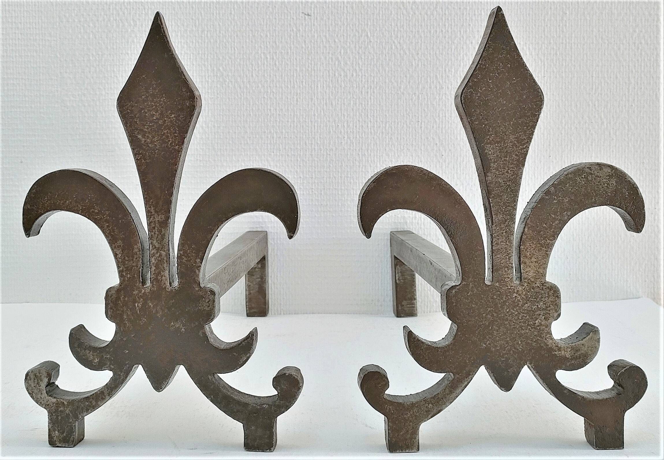Pair of vintage steel fleur-de-lys andirons