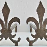 Pair of vintage steel fleur-de-lys andirons