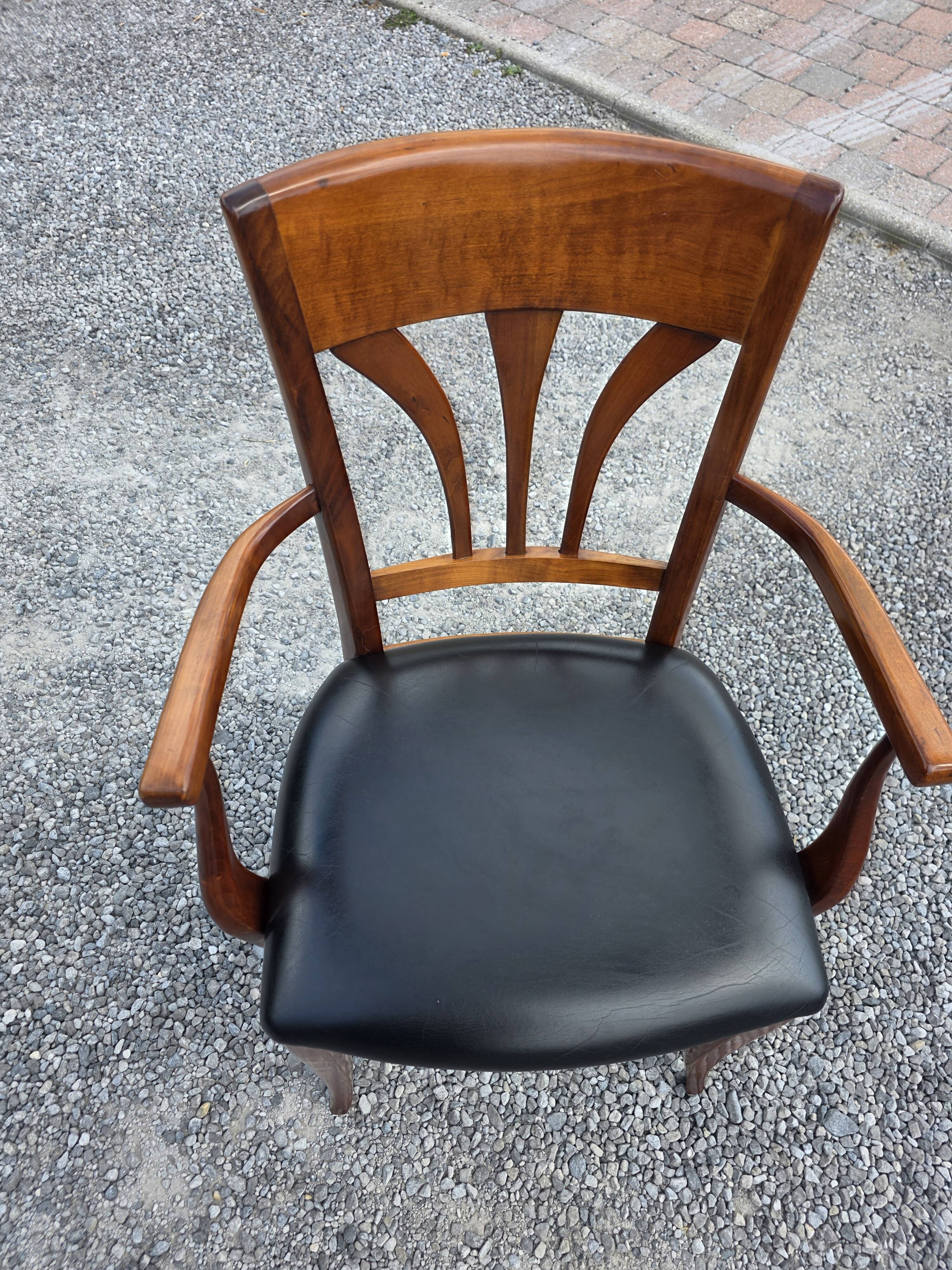 Mid-20th century solid cherry wood office chair.