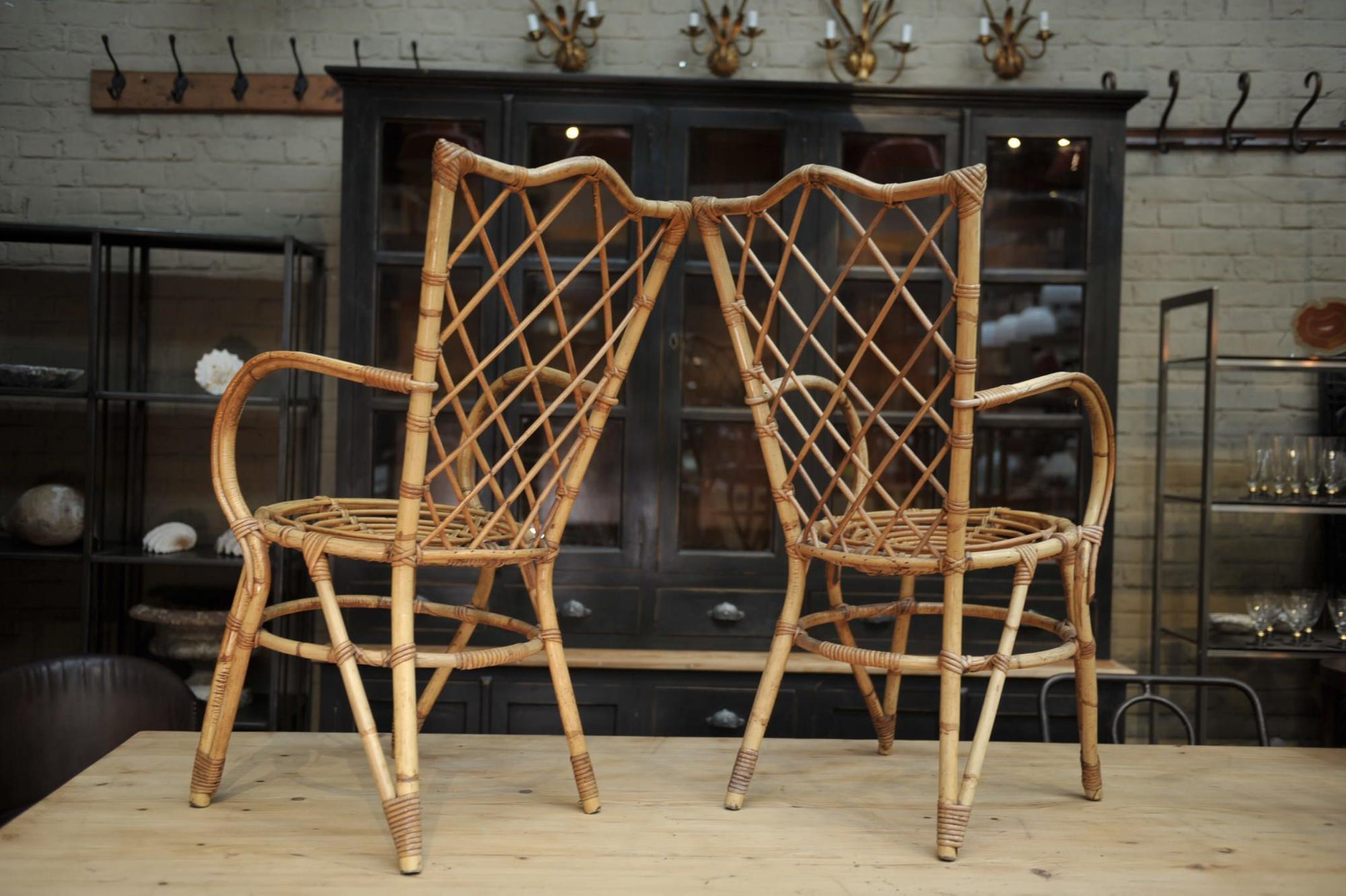 Pair of chairs in rattan 1960 by Louis Sognot