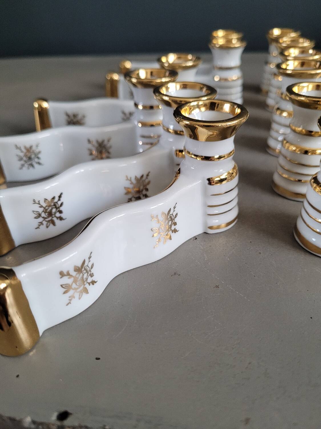 12 Limoges art porcelain knife rests in their case