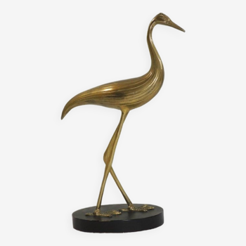 Brass bird on blackened wooden base / vintage