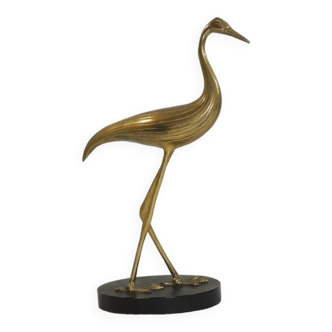 Brass bird on blackened wooden base / vintage