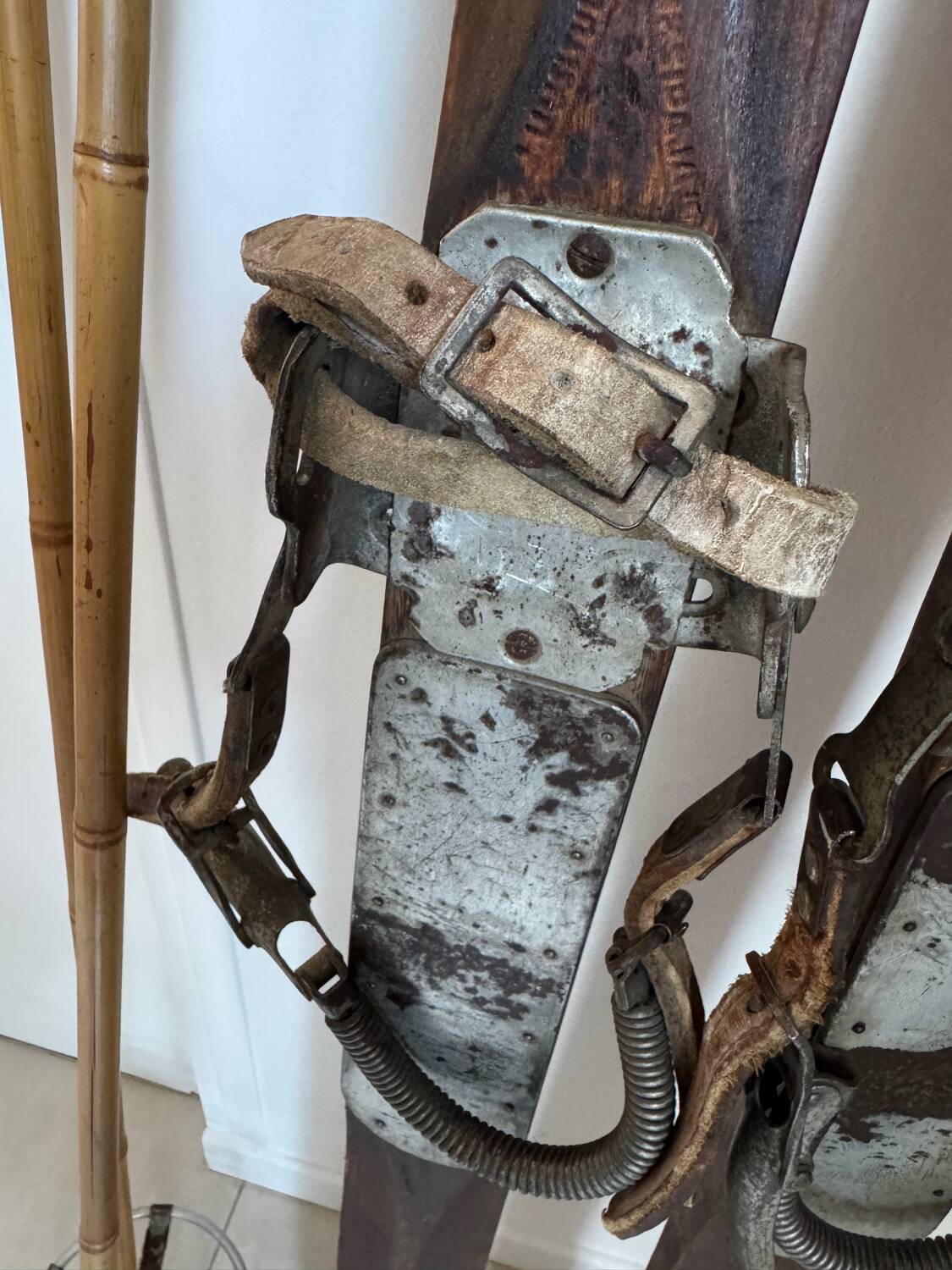 Antique wooden skis with vintage poles