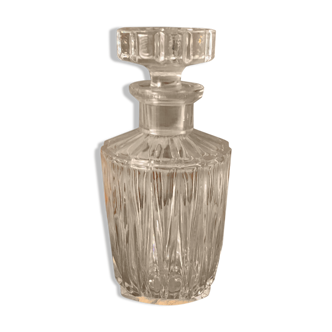 Chiseled glass decanter with glass cap