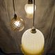 Suspension triple opaline with engraved and frosted glass in shades of yellow-orange.