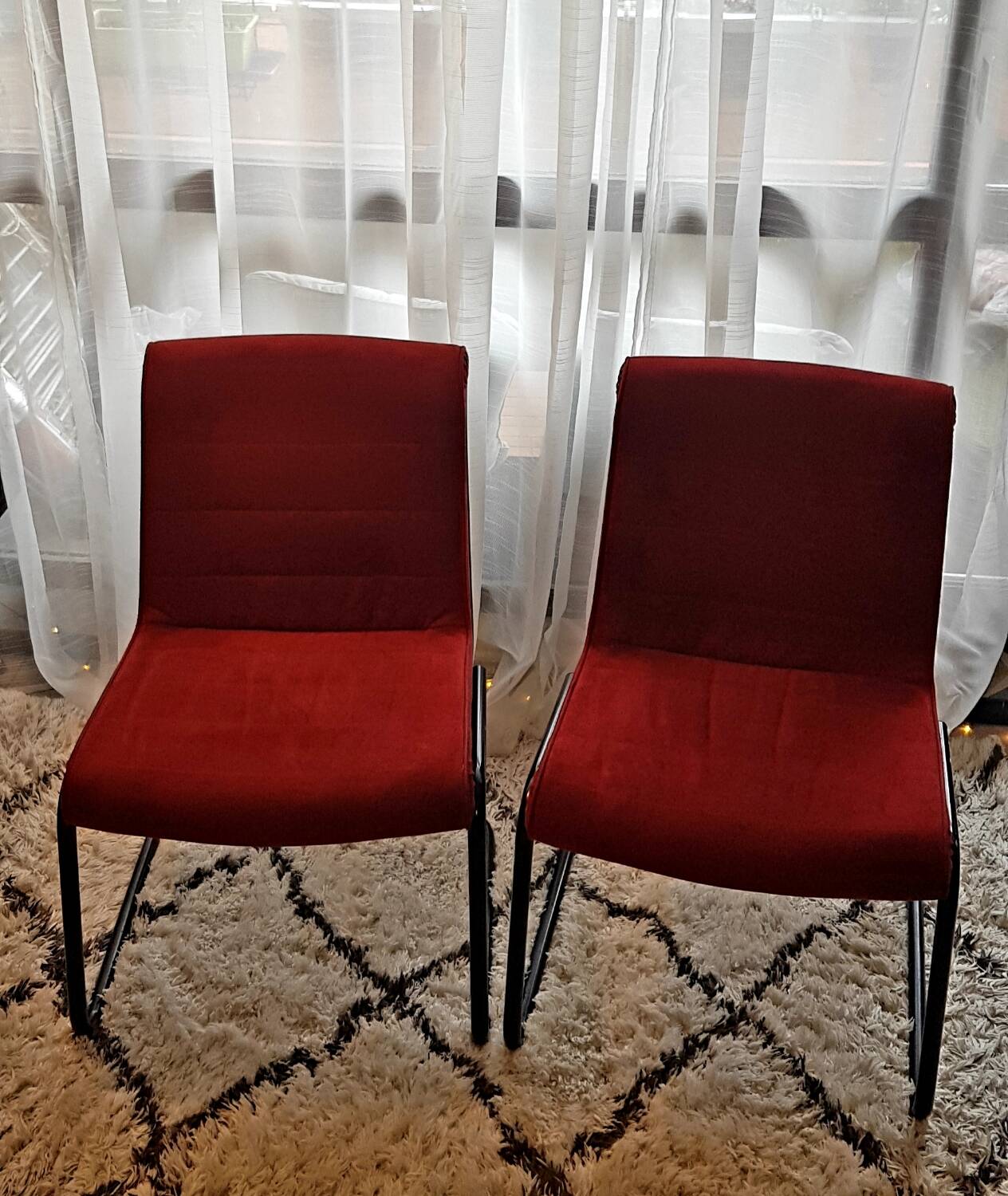 Red suede chairs, Knoll.