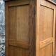 Solid oak compass foot cabinet René Gabriel 1945