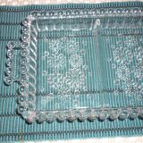 Antique dish in chiseled glass with pearls