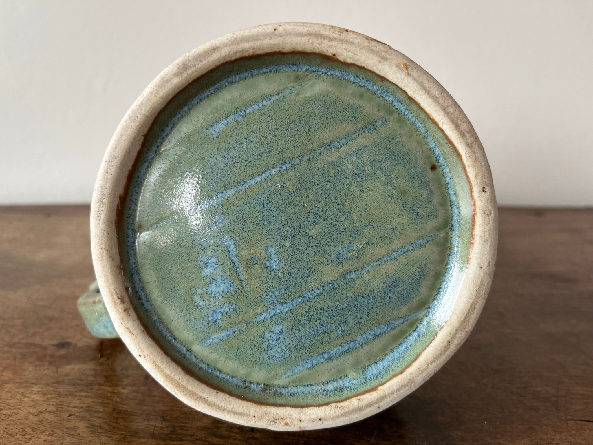 Pitcher in flamed sandstone