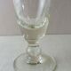 Old wormwood glass in molded glass, in thick glass