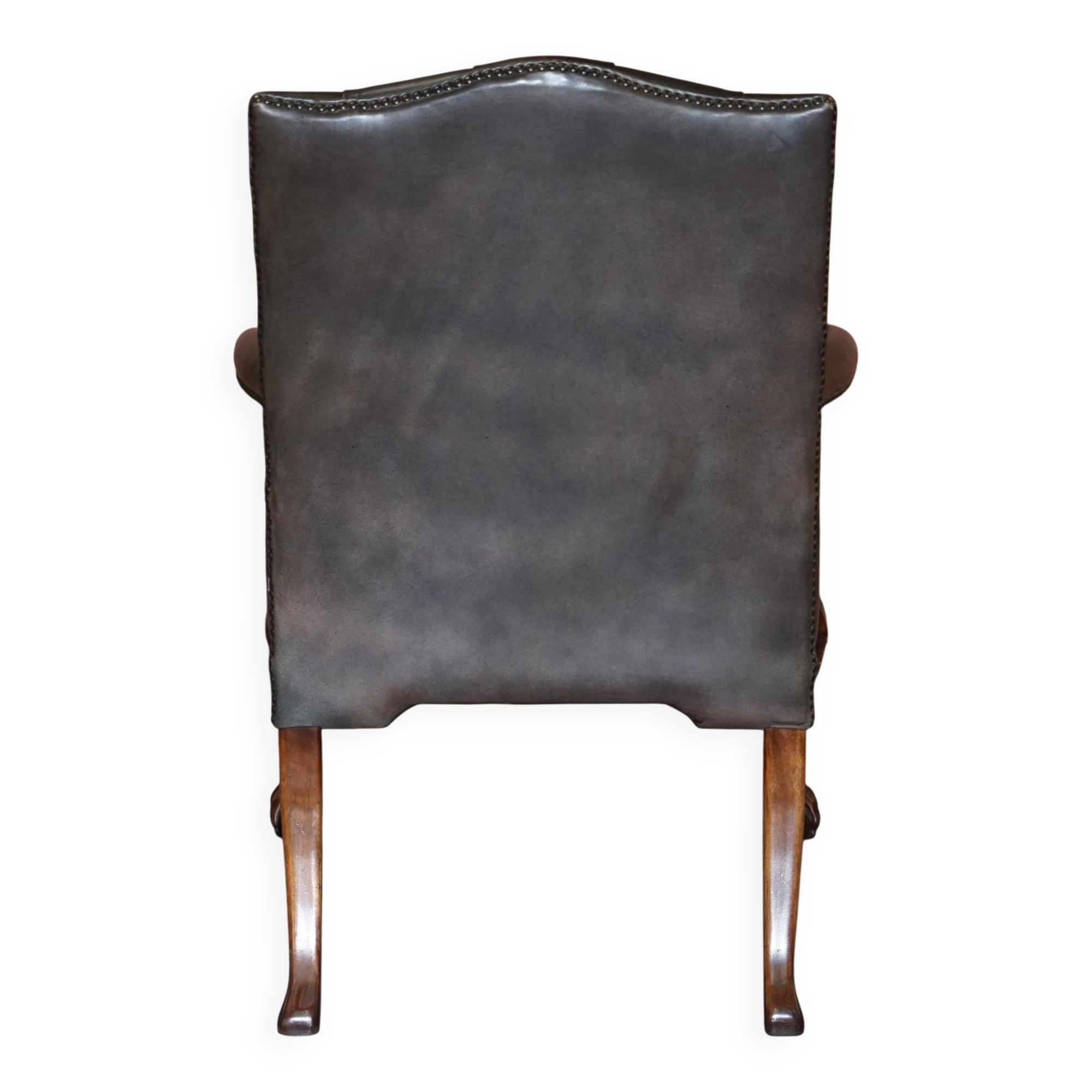Gainsborough armchair George II leather Chesterfield hand-carved with claw and ball feet.